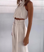 two-piece satin set with a halter top and wide-leg trousers