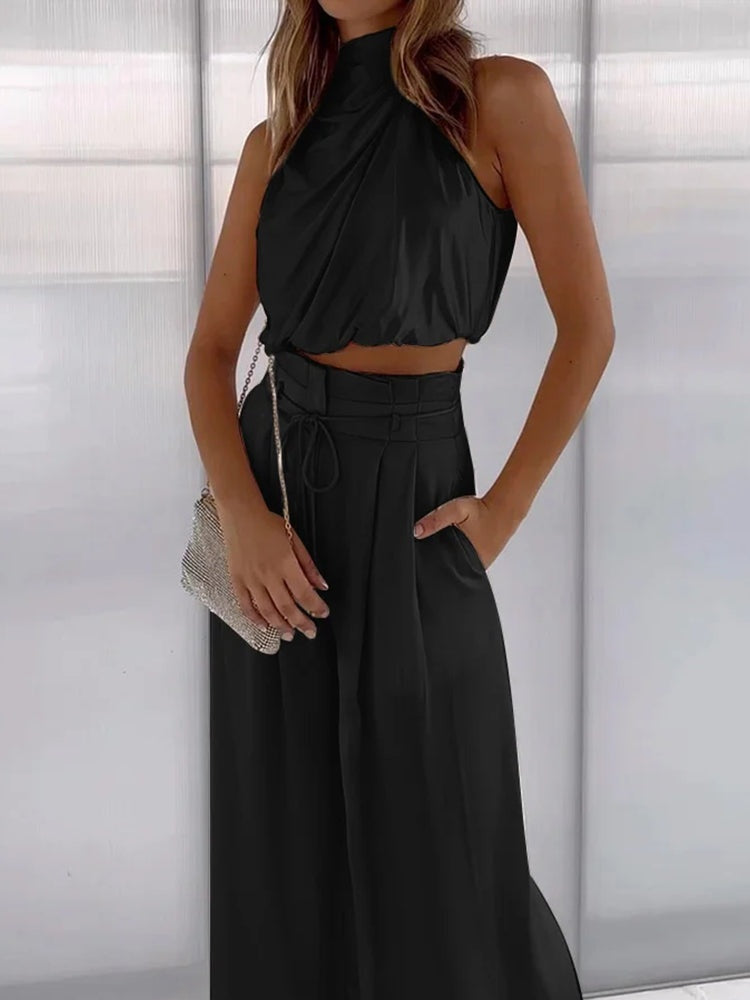 two-piece satin set with a halter top and wide-leg trousers