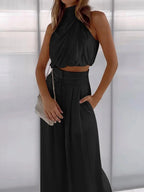 two-piece satin set with a halter top and wide-leg trousers