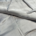 two-piece satin set with a halter top and wide-leg trousers